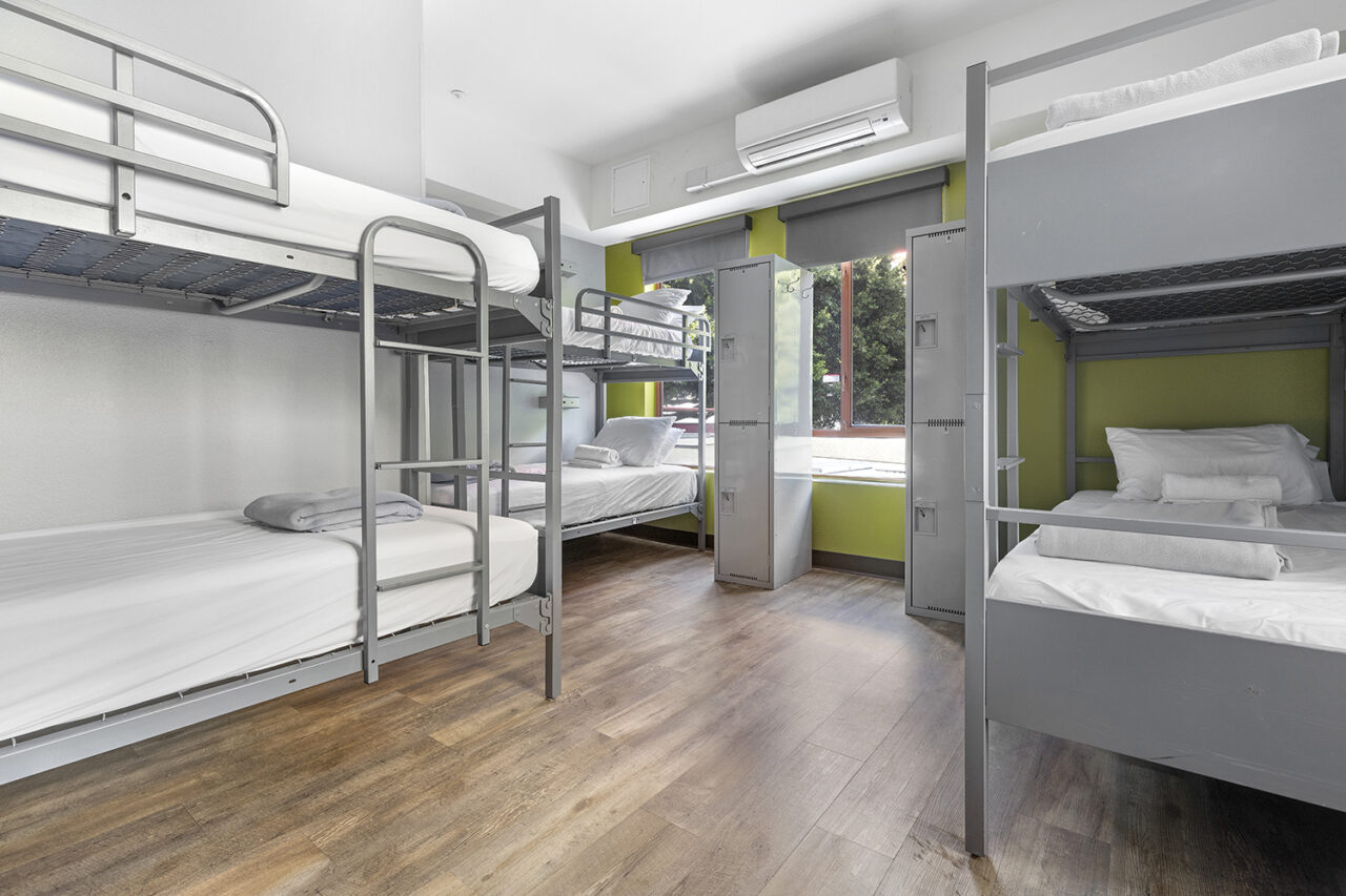 a clean and bright 10-bed dorm room at HI Los Angeles Santa Monica hostel