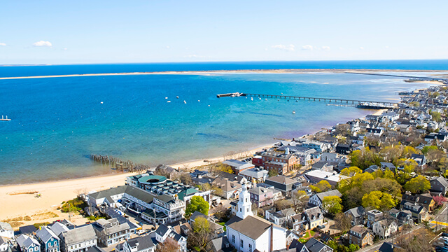 an aerial view of the coastline of Provincetown, MA
