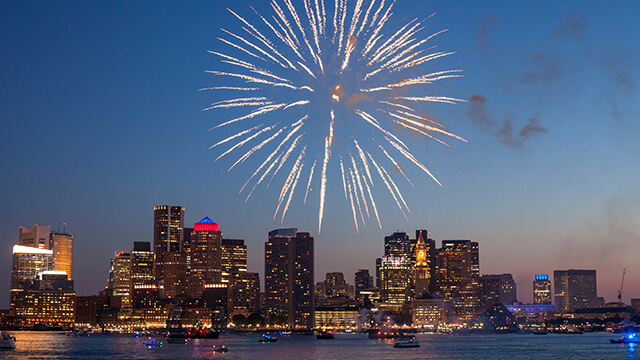 fireworks on the fourth of july over the Boston Skyline