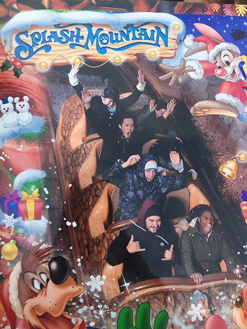 the author on the splash mountain ride at Tokyo Disney with her hostel friends