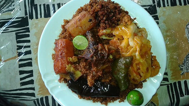 A plate of yassa at Yassa restaurant in Bronzeville Chicago